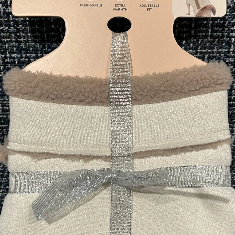 Dog jacket Sherpa lined with buckle neck closure. Cream color tan detailing. XS